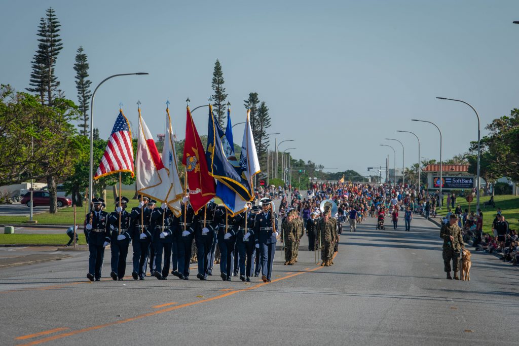 U.S. military members, veterans and their families participate in the Veteran's Day Parade, Nov. 11, 2018, at Kadena Air Base, Japan. Veteran’s Day Parades are celebrated across U.S. military stations both at home and abroad. (U.S. Air Force photo by Senior Airman Kristan Campbell)