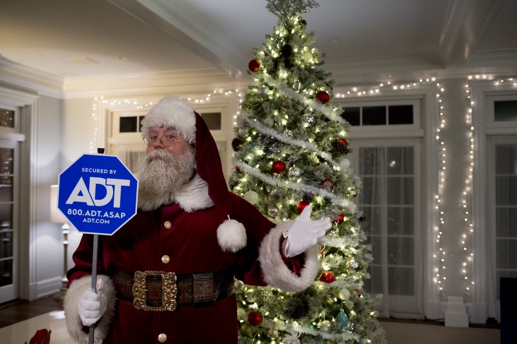 Santa Claus, with the help of ADT, protecting your home for the holidays.