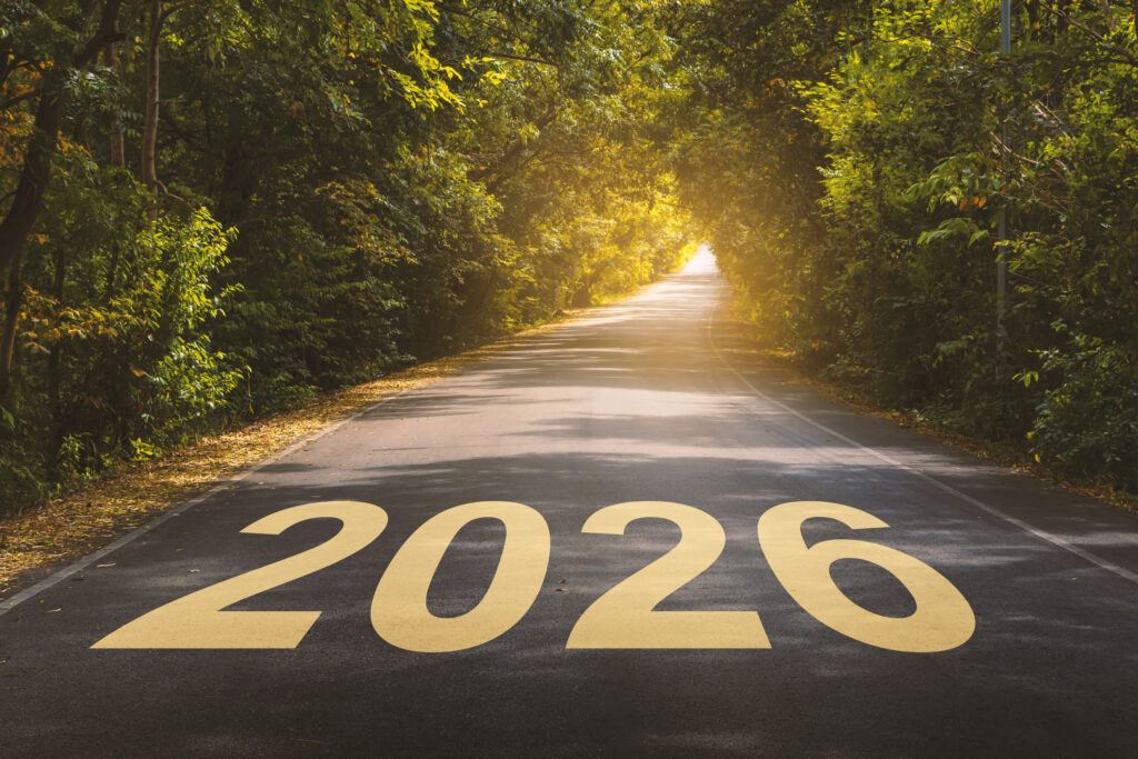 Road stretching into the distance with “2026” displayed on the pavement